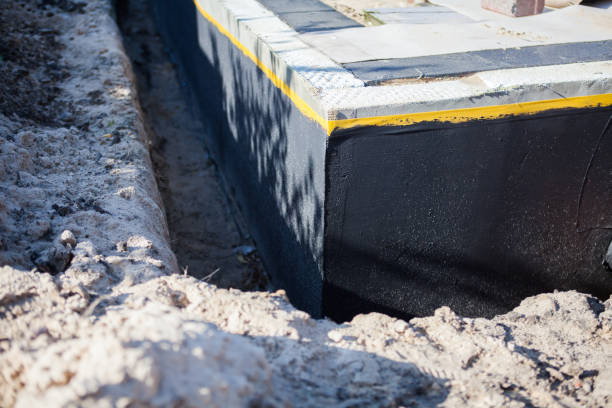 Professional Waterproofing technician working in Phoenix, OR